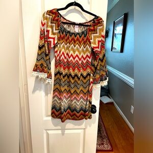 Size small. Pink coconut boutique.‎ Slim dress with cute Fringe.